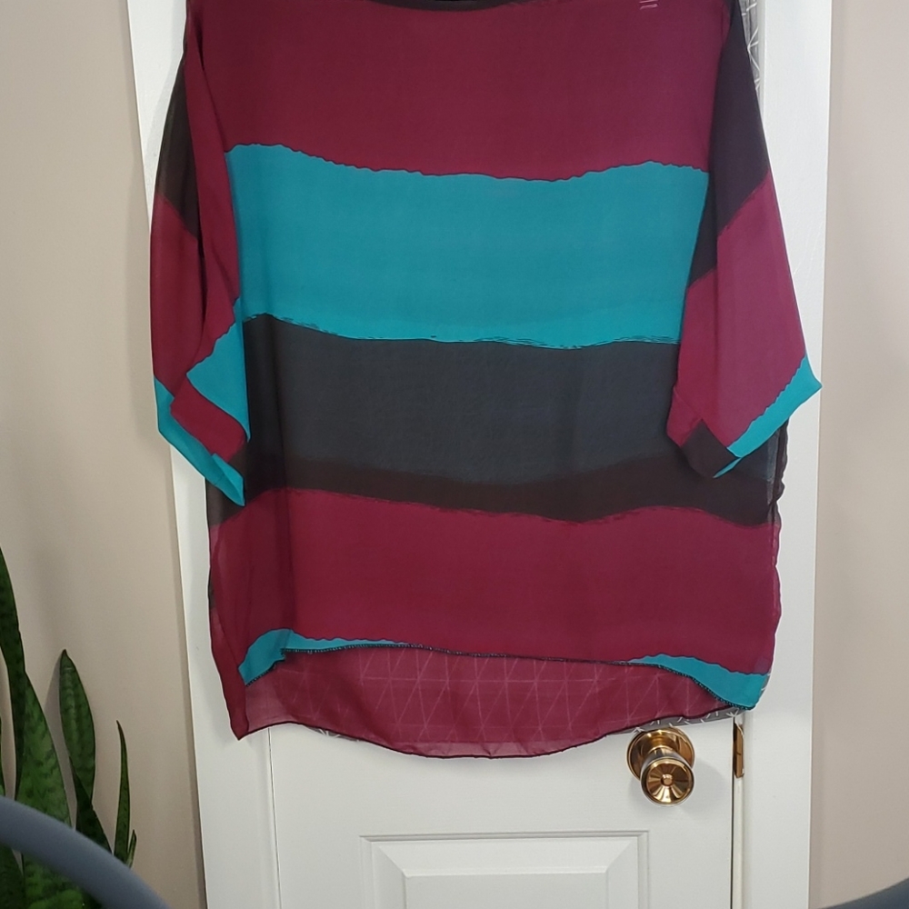 Jewel tone batwig top
